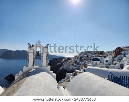 This picture is a sacred place or a church in Greece. There are people living in groups like a community living next to a river. If you look at it from this angle, you can see many things, which are v