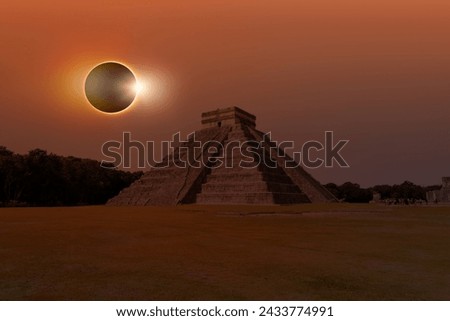 Solar Eclipse - Pyramid of Kukulcan in the Mexican city of Chichen Itza - Mayan pyramids in Yucatan, Mexico Royalty-Free Stock Photo #2433774991
