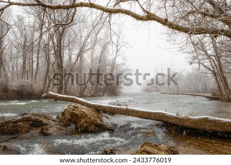 Winter landscape views along the Wataunga River at Sycamore Shoals State Historic Park in Elizabethton, Tennessee, USA Royalty-Free Stock Photo #2433776019