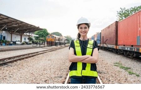 Portrait of woman engineer railway standing and looking camera in train factory. Maintenance cycle concept. Royalty-Free Stock Photo #2433776567