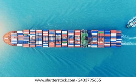 Cargo Container Ship running with with Tugboat. container ship import export to customers sea port. export shipping industry freight and transportation logistics concept.