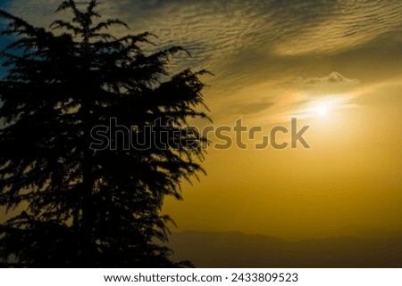 Sunset view from the mountains of Lansdowne. Mountain Sunset view in Lansdowne. Amazing  golden sunset seen through forest drive, Lansdowne Uttarakhand.
