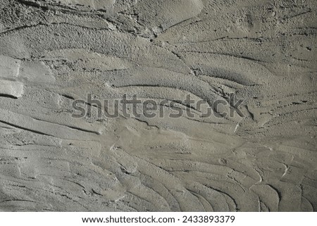 Rough cement texture background, Material wet concrete for plaster wall, floor concrete. Texture of ready mixed concrete cement mortar. Royalty-Free Stock Photo #2433893379