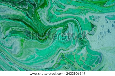 Beautiful fluid art natural luxury painting. Marbleized effect. Ancient oriental drawing technique. Teal, green, blue and turquoise colors. Abstract decorative marble texture.  Royalty-Free Stock Photo #2433906349