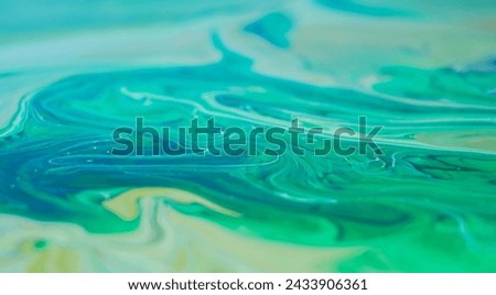 Beautiful fluid art natural luxury painting. Marbleized effect. Ancient oriental drawing technique. Teal, green, blue and turquoise colors. Abstract decorative marble texture.  Royalty-Free Stock Photo #2433906361