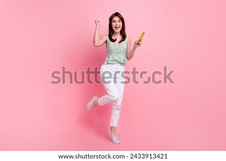 Full length photo of overjoyed glad girl rejoice free wifi speed 5g connection isolated on pink color background