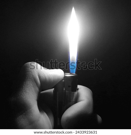 Black And White Photo With Huge Lighter Flame
