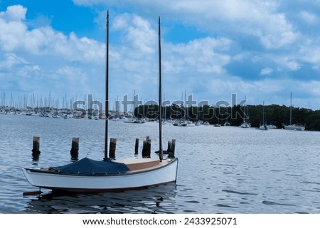 Photography of a white sailboat at a South Florida Bay.