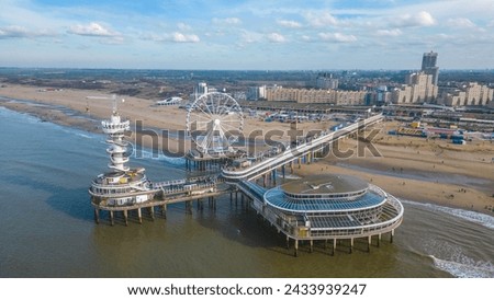 A mesmerizing aerial view from The Pier SkyView, captured by a drone, offers a unique perspective of the iconic Scheveningen Pier in The Hague, Netherlands