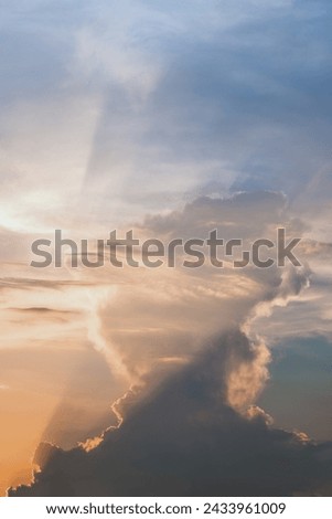 Cloudscape, Colored Clouds at Sunset near the Ocean in a Tropical Climate