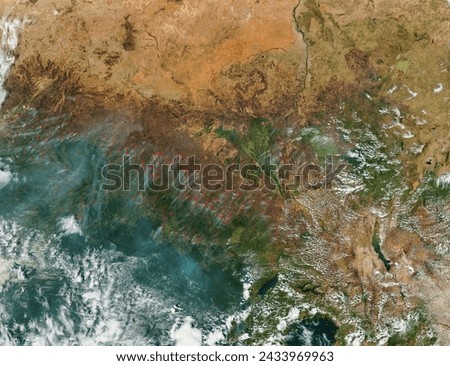 Fires in central Africa. Fires in central Africa. Elements of this image furnished by NASA. Royalty-Free Stock Photo #2433969963