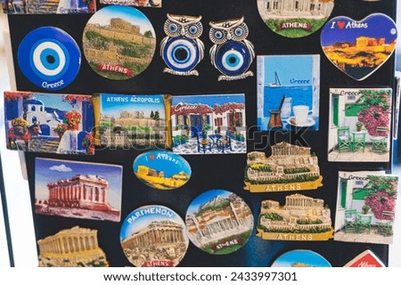 Traditional tourist souvenirs and gifts from Athens, fridge magnets with text "Athens", and key ring keychain, mugs and toys in a local vendor shop in Plaka district, Attica, Greece, greek souvenirs
 Royalty-Free Stock Photo #2433997301