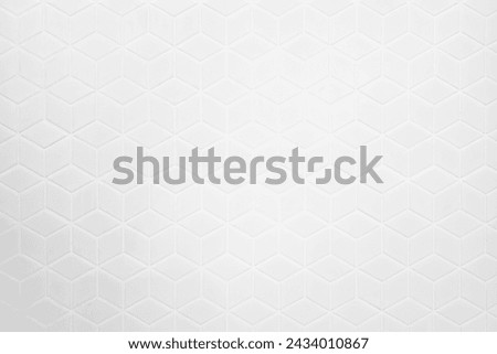 White Hexagon Tile Wall Background with Spotlight at the Center.