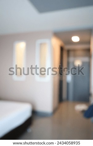 Blur focus of a hotel room while on summer vacation, Travel lifestyle concept.Blur luxury bedroom suite in hotel.