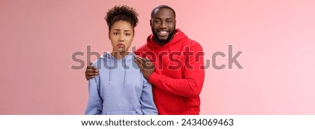 Girl unwilling participate event feel nervous insecure boyfriend encouraging hugging boost confidense assuring everything alright smiling self-assured promise everything be okay, pink background. Royalty-Free Stock Photo #2434069463