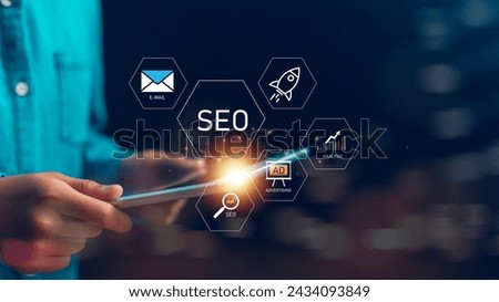 Businessmen with SEO icons on a virtual screen. SEO concept, Promoting ranking traffic on a website and optimizing your website to rank in search engines. 
