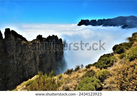 Part of Drakensberg Amphitheatre - geographical feature more than 5 kilometres in length with precipitous cliffs rising 1,220 metres along its entire length (Royal Natal National Park, South Africa) Royalty-Free Stock Photo #2434123923