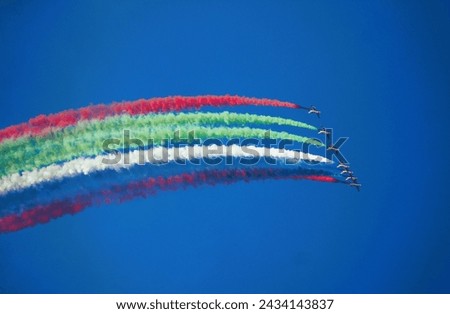 The most spectacular formation maneuver
 of aerobatics at Dubai Air Show. Royalty-Free Stock Photo #2434143837