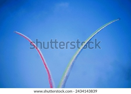 The most spectacular formation maneuver
 of aerobatics at Dubai Air Show. Royalty-Free Stock Photo #2434143839