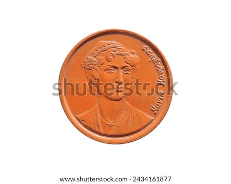 Obverse of Greece coin 2 drachmas 1988, isolated in black background. Close up view. Royalty-Free Stock Photo #2434161877
