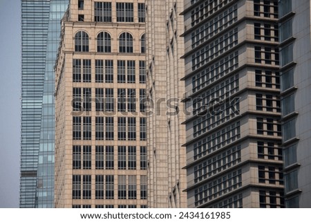 The city of Shanghai has many tall towers, as well as shapes with different architecture, photography of the pattern of the structure and the icons of the windows of different towers in this city