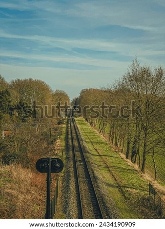 Railway tracks in the countryside. Vintage retro style toned picture