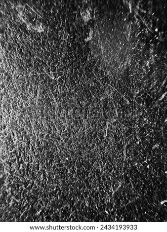 Raw photo of steel surface with cold, dark and grey look to it.
