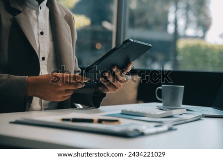 Office, tablet and business man happy for positive financial savings, finance budget report or administration feedback. Growth analytics, data analysis review and person smile for research statistics