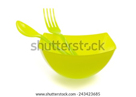 bowl and plastic cutlery isolated on white background