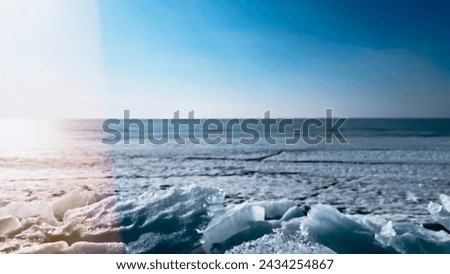 Frozen sea background with ice blocks on shore. Frozen lake horizon under blue sky. Ice drifts. Vintage background with lens flare. and copy space. Soft focus. film grain pixel texture. Defocused.