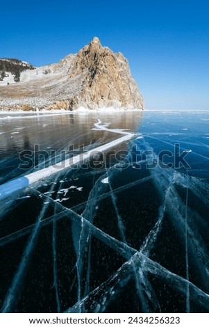Ice of Lake Baikal, the deepest and largest freshwater lake by volume in the world, located in southern Siberia, Russia Royalty-Free Stock Photo #2434256323