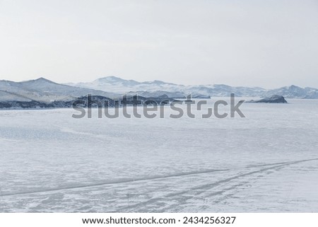 Lake Baikal in winter, the deepest and largest freshwater lake by volume in the world, located in southern Siberia, Russia Royalty-Free Stock Photo #2434256327
