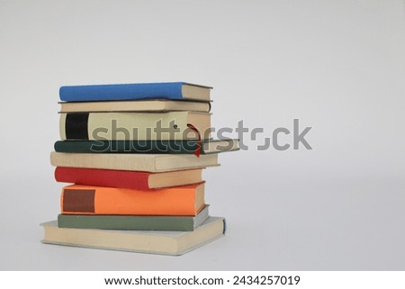 Isolated books on a white background, a set of books by the world's best writers, photo illustration for literature, science, science, learning, studying, history, education
