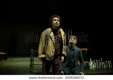 Actors and actresses play a modern performance of the theater stage show Royalty-Free Stock Photo #2434268213