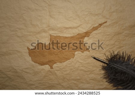 map of cyprus on a old vintage paper background with old pen