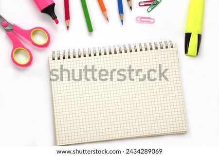 School supplies and office supplies on white background. Learning, study, office equipment and presentation concept.