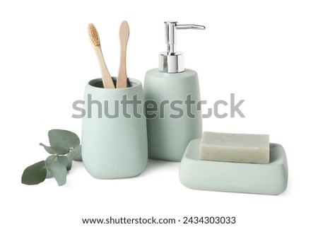 Bath accessories. Set of different personal care products and eucalyptus leaves isolated on white