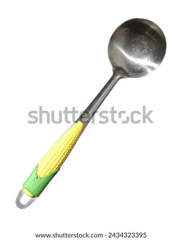 spoon with yellow and blue handle, for cooking