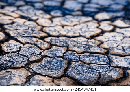 Closeup Pattern of Burned Parched Wood Texture Royalty-Free Stock Photo #2434347451