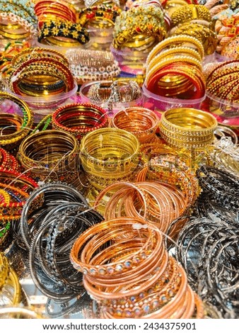 Bangles for girls, silk bangles of different colors. Pictures of stole design gold bangle in stone