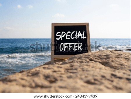 Special Offer symbol. Concept word Special Offer on black chalk background. Beautiful sea background. Business and Special Offer concept. Copy space