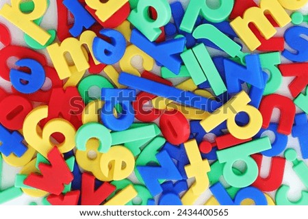 coloured alphabet magnetic letters background