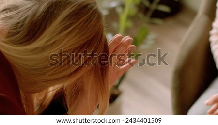 Psychologist social worker touches client's hands close-up. Individual counseling session to addiction recovery and overcoming dependencies. Therapy to addiction issues and journey towards recovery. Royalty-Free Stock Photo #2434401509