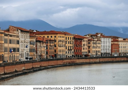 Embankments of the Arno River in the center of Pisa, in Tuscany, central Italy Royalty-Free Stock Photo #2434413533