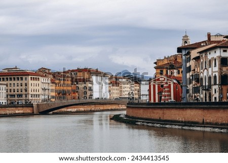Embankments of the Arno River in the center of Pisa, in Tuscany, central Italy Royalty-Free Stock Photo #2434413545