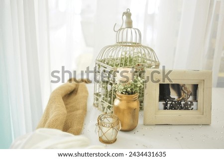 Indoor wedding decoration ideas with picture frame flowers and jars
