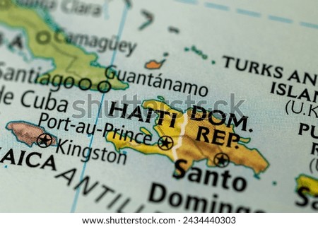 Close-up on Haiti and Dominican Republic on a map. Royalty-Free Stock Photo #2434440303