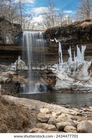 Minnehaha Falls in Early March, Minneapolis, Minnesota, Slow Shutter Speed, Blue Sky and Clouds, Frozen Cliff Walls