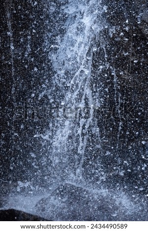 Patterns of falling water are revealed with a high shutter speed, stopping action in part of Blackledge Falls in Glastonbury, Connecticut.