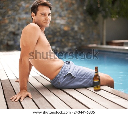Man, relax and thoughts by swimming pool at resort with beer to drink or chill on summer vacation, luxury and villa. Male person, bottle and alcohol for refreshments on tropical holiday in Maldives.